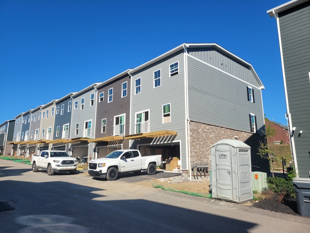 Townhome complex after siding install, finished exterior