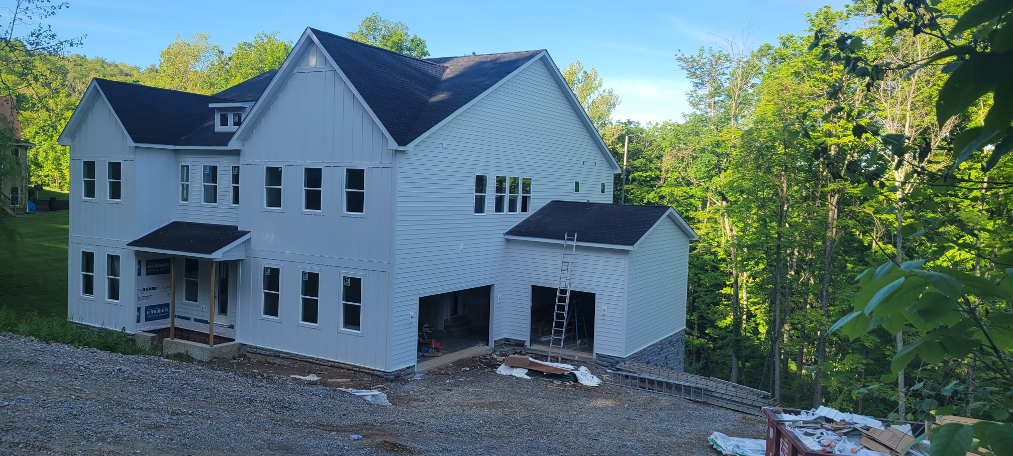 Townhome complex with house wrap installed before siding